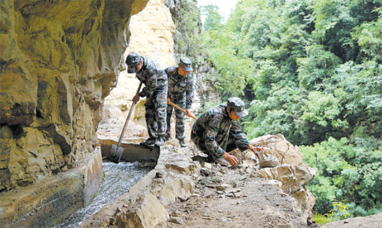 從絕壁開(kāi)渠到鄉村振興，幾代退役軍人和民兵骨干接力奮斗-云南能投軍創(chuàng  )產(chǎn)業(yè)投資有限公司